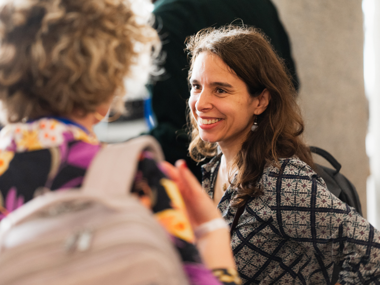 Smiling woman engaged in conversation